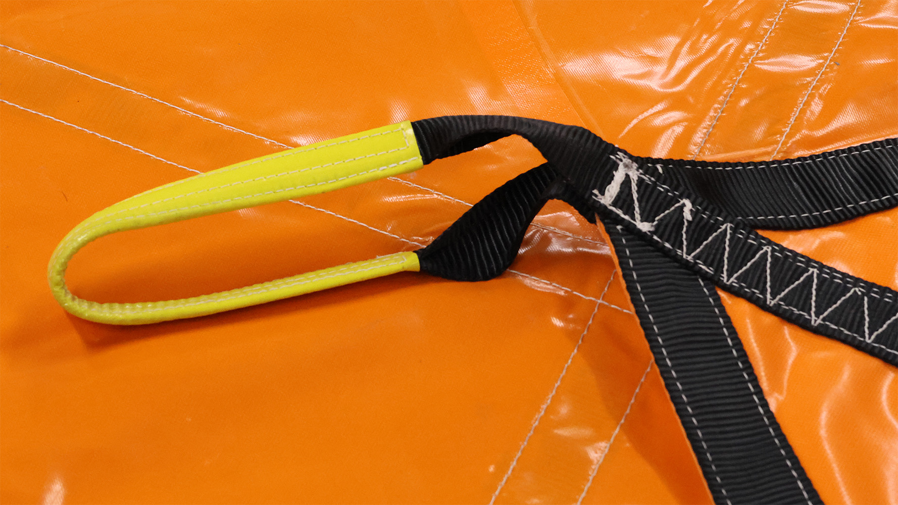 snow removal tarp construction jobsite protection fabric webbing sling