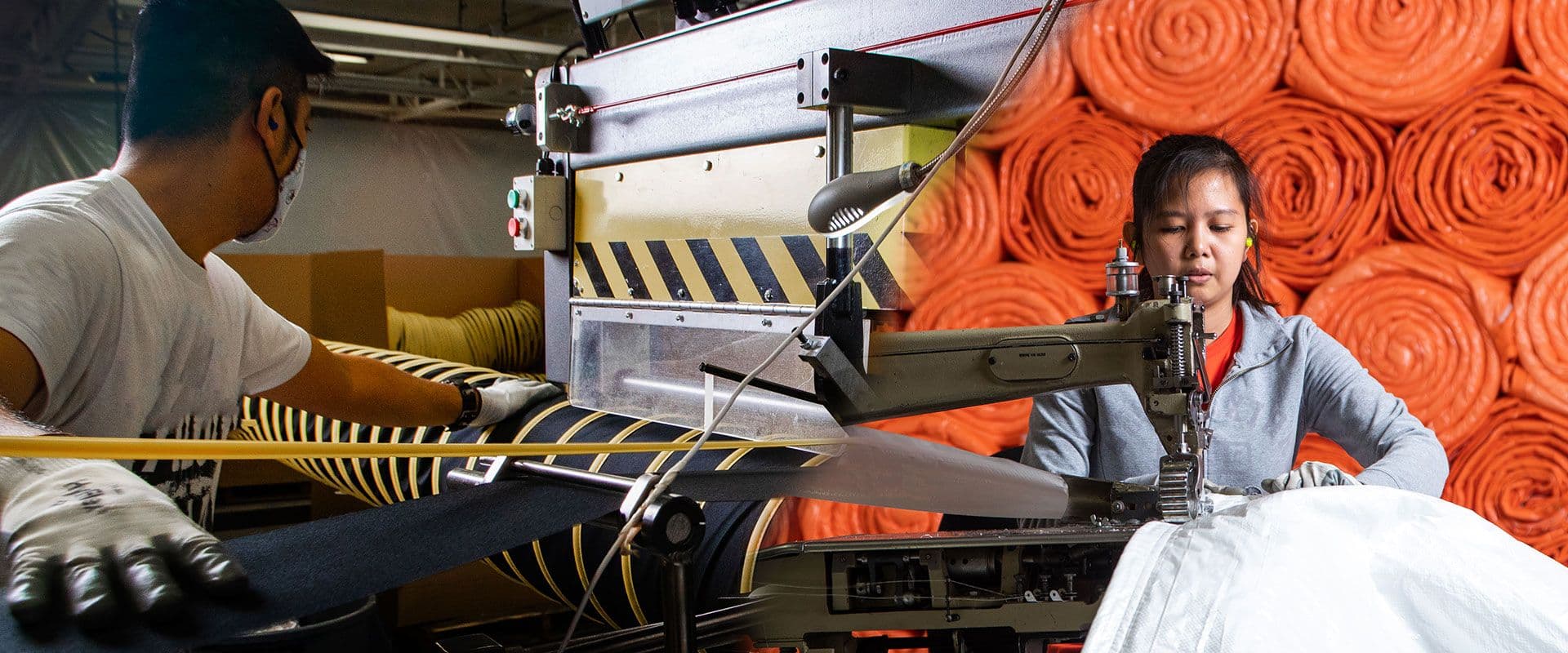 People working on industrial equipment