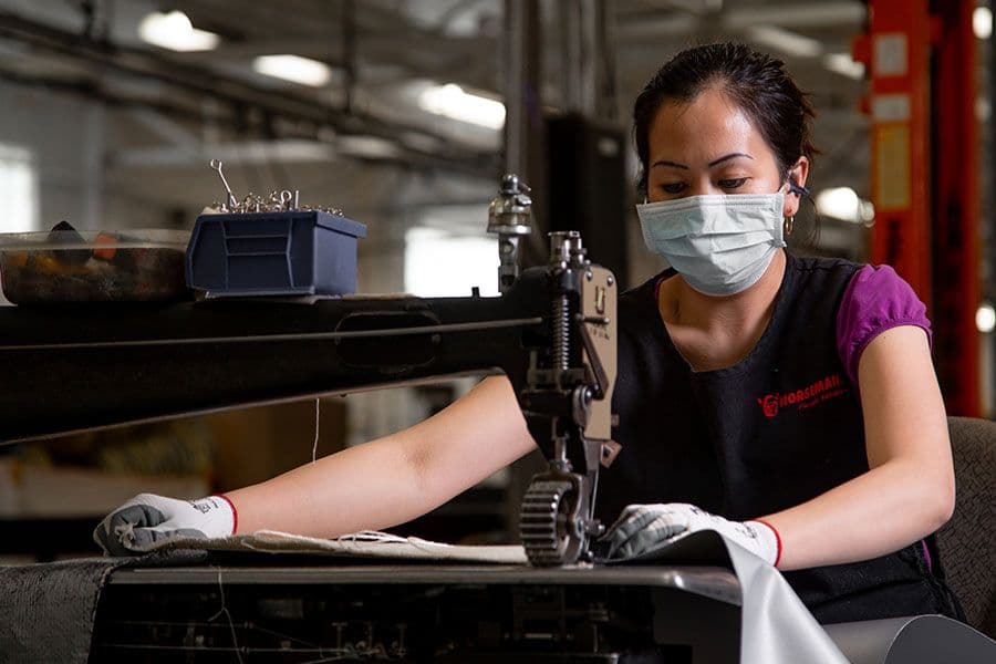 Woman doing industrial sewing